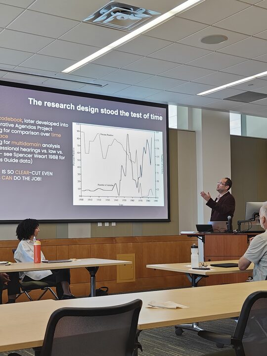 Miklós Sebők on AI in comparative politics at the Bryan D. Jones conference in Austin